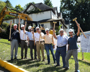 East End Village collaborators celebrate start of demolition